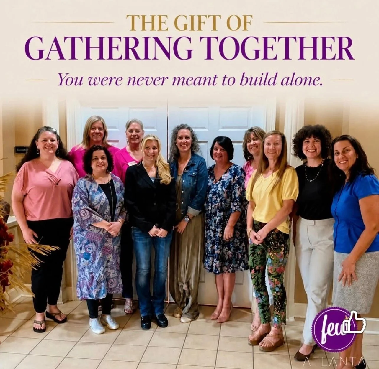 A group of women gathered together at a FEW ATL meeting.